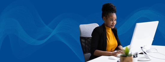 Woman on her computer with blue background and tech waves 