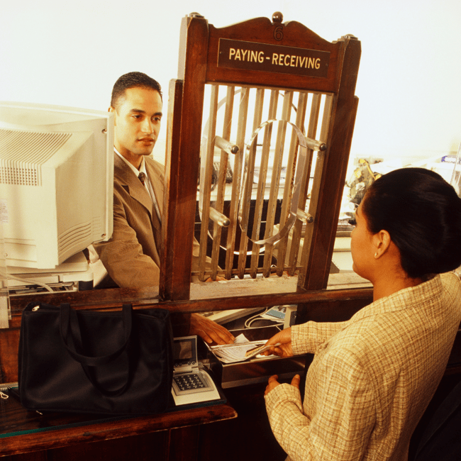 Outdated bank teller window 