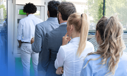 People waiting in line at ATM