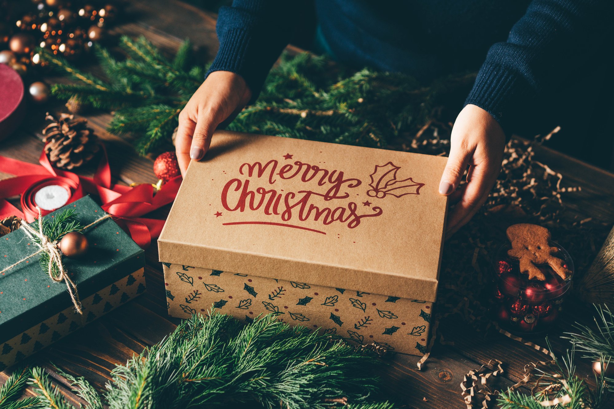 woman-preparing-presents-for-christmas-2023-11-27-05-33-53-utc