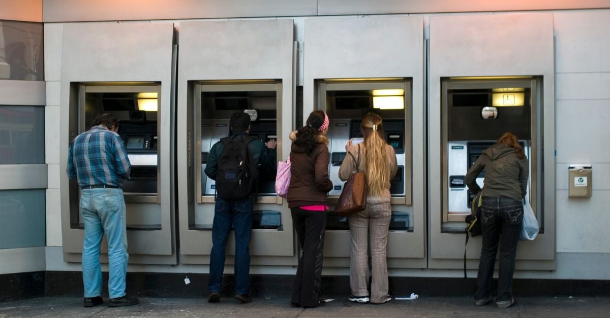 People using ATM's outdoors 