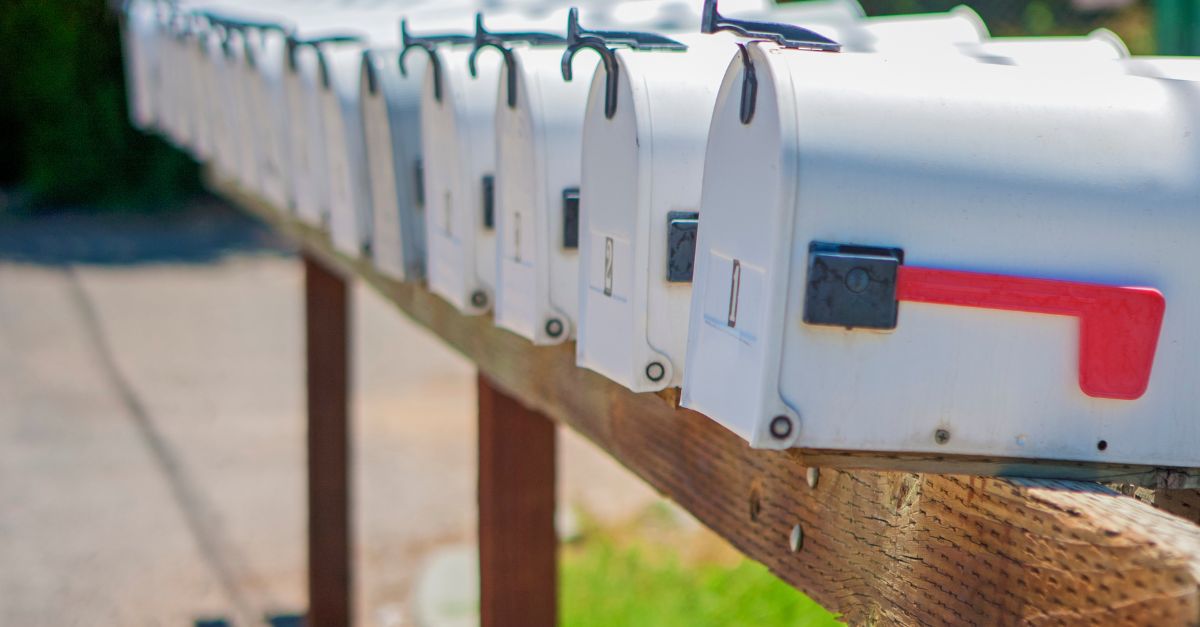 Silver mailboxes in a row