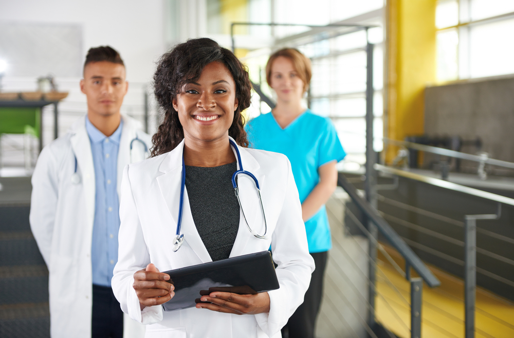 doctors and nurses standing in a hospital 