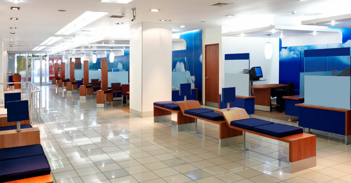 Empty bank building with blue benches are offices